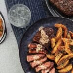 Southwest Steaks with Creamy Peppercorn Sauce & Herb Parmesan Fries